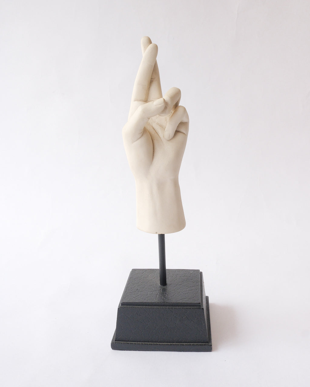 Hand sign plaster sculpture