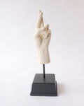 Hand sign plaster sculpture