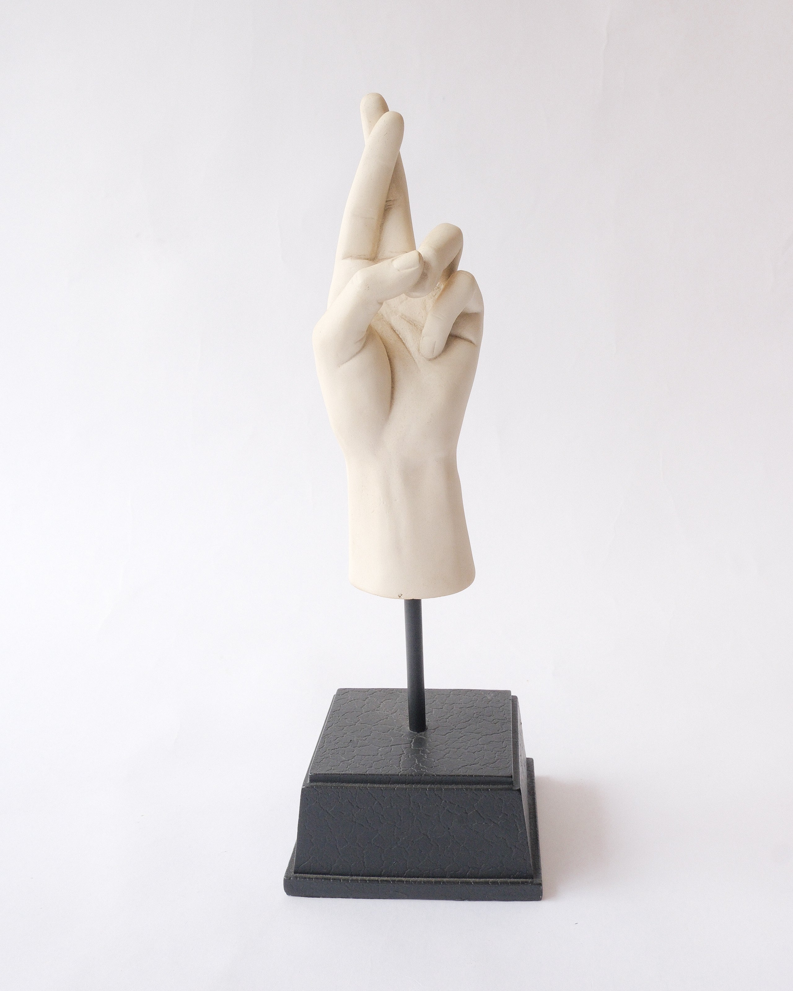 Hand sign plaster sculpture