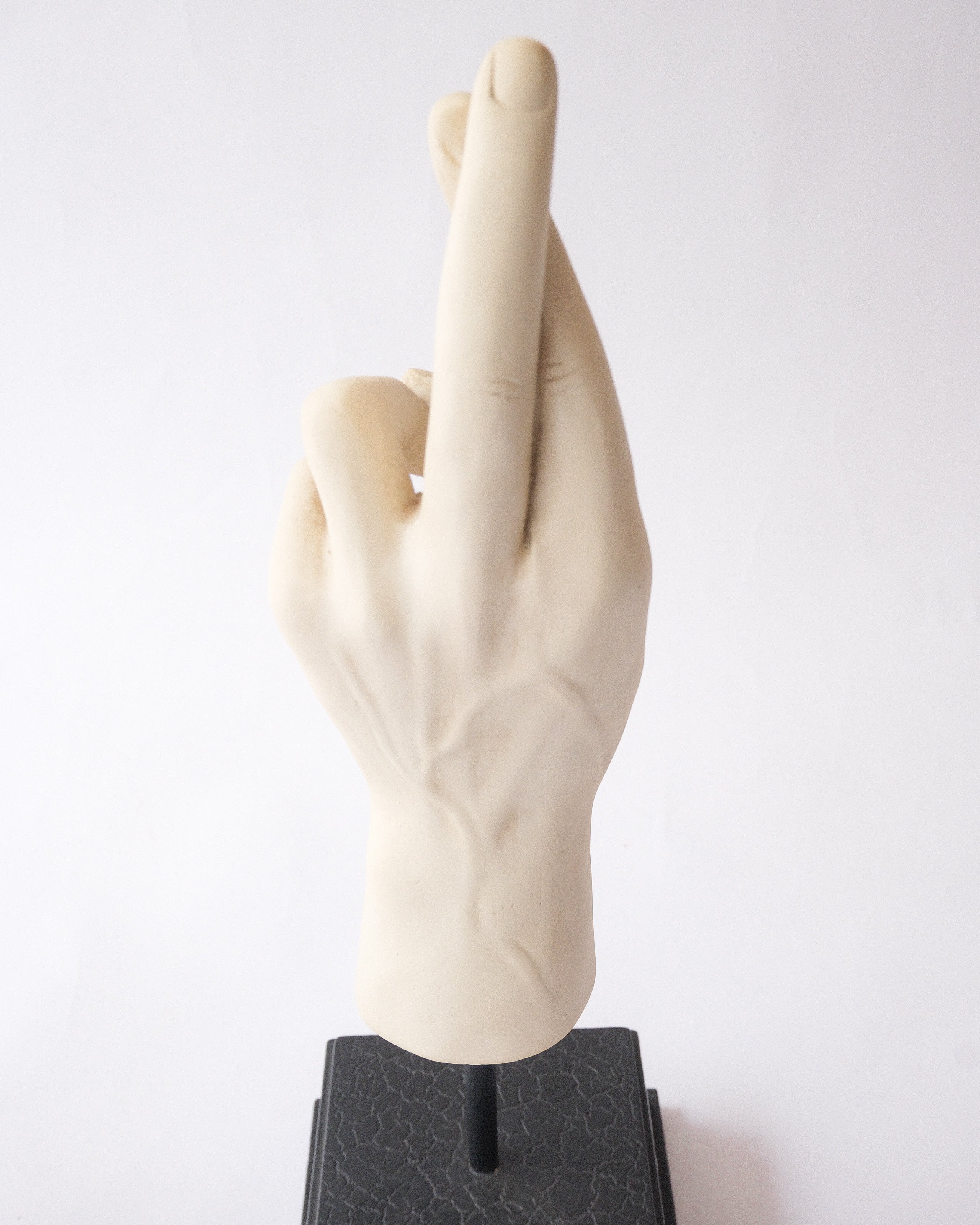 Hand sign plaster sculpture