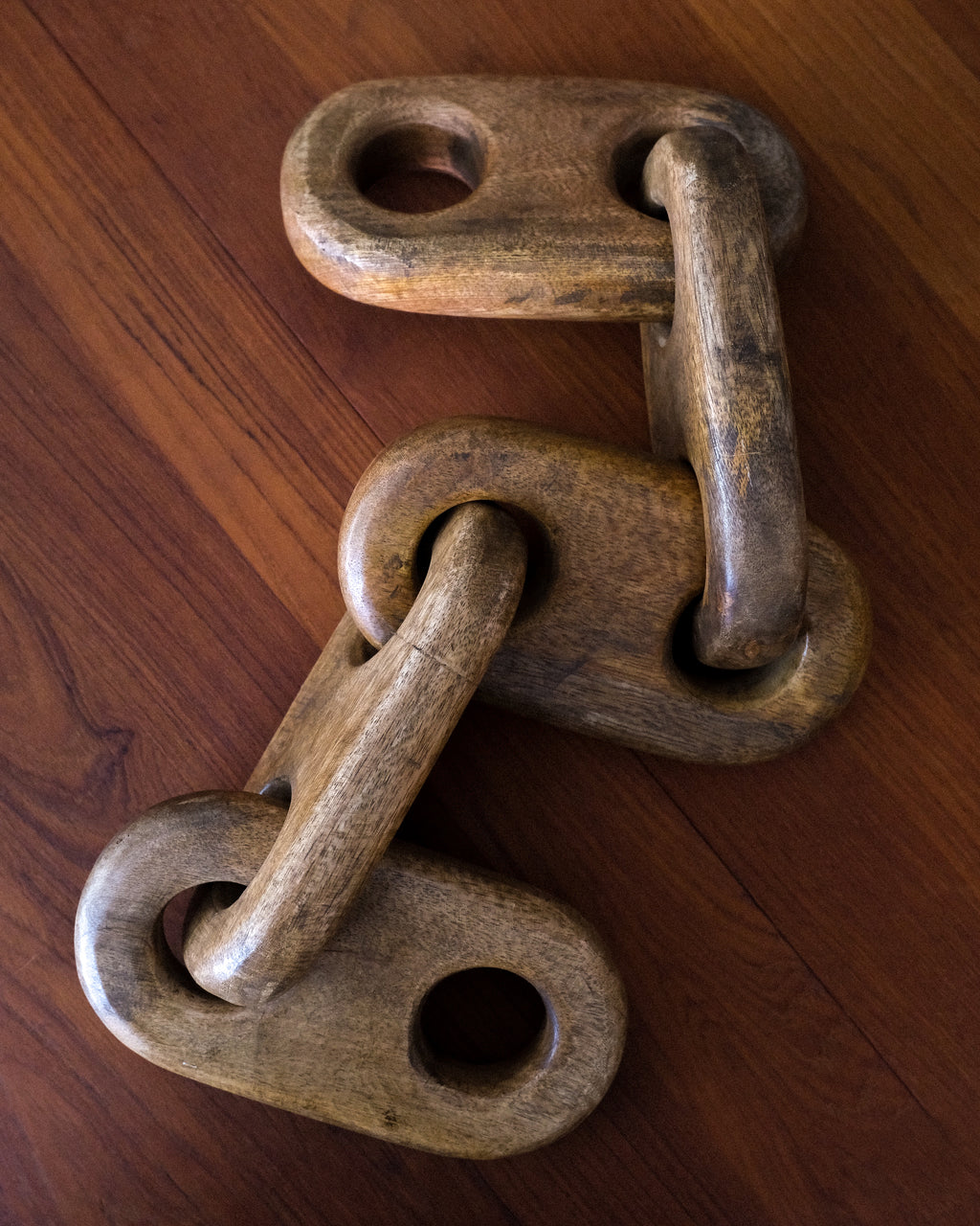 Wooden chain sculpture