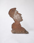 Rustic iron face silhouette