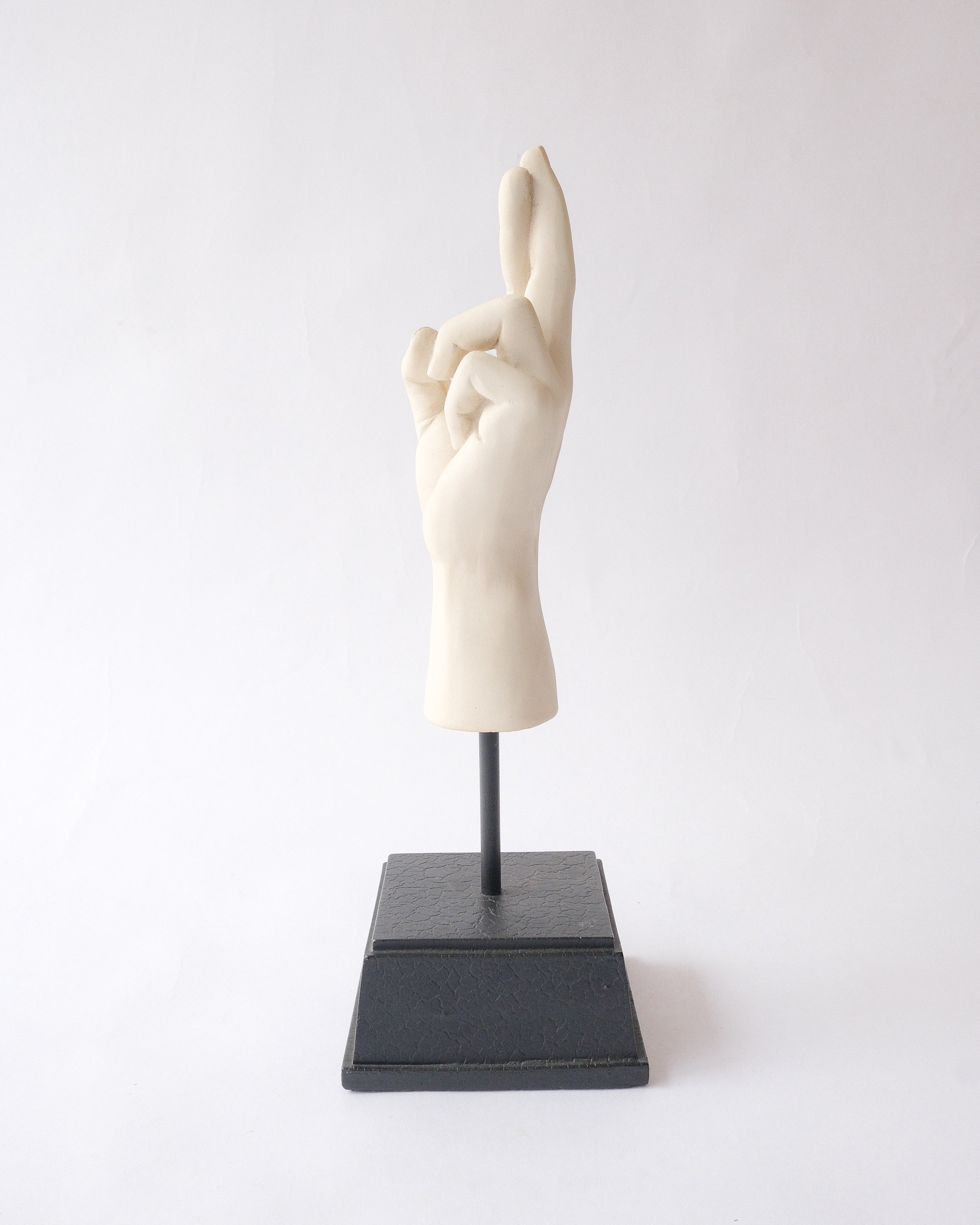 Hand sign plaster sculpture