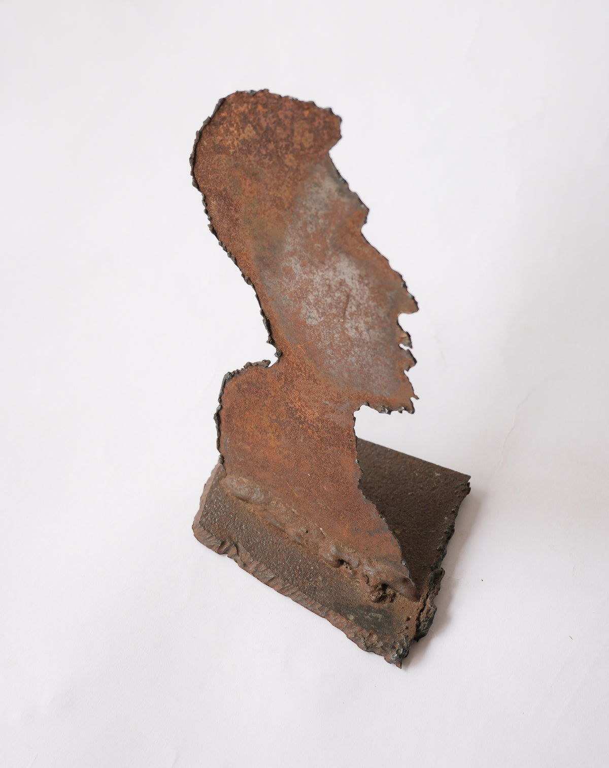 Rustic iron face silhouette