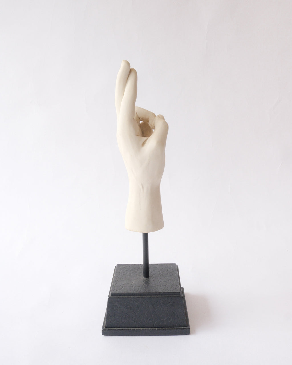 Hand sign plaster sculpture