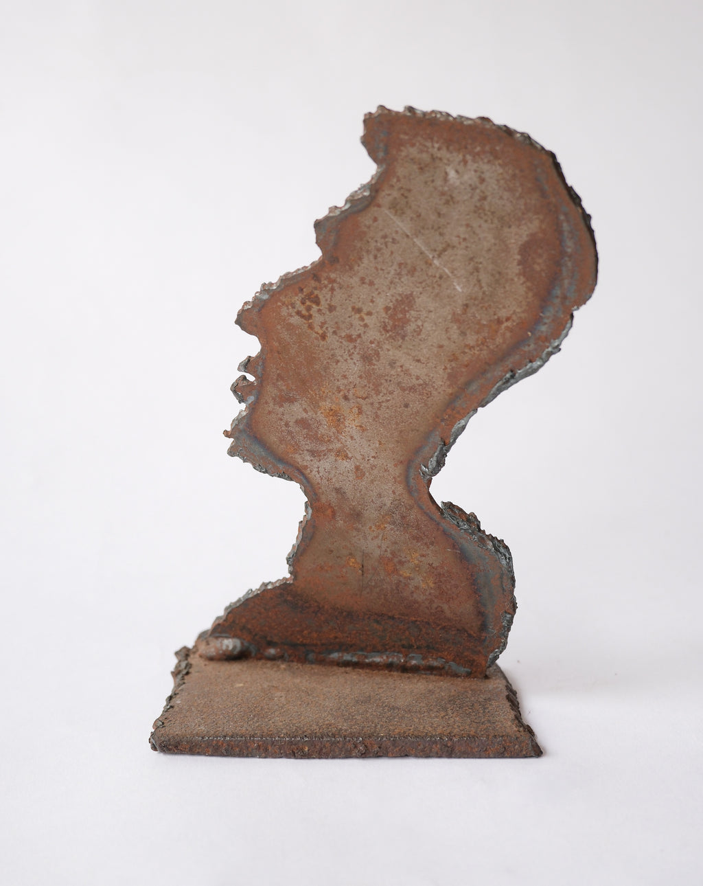 Rustic iron face silhouette
