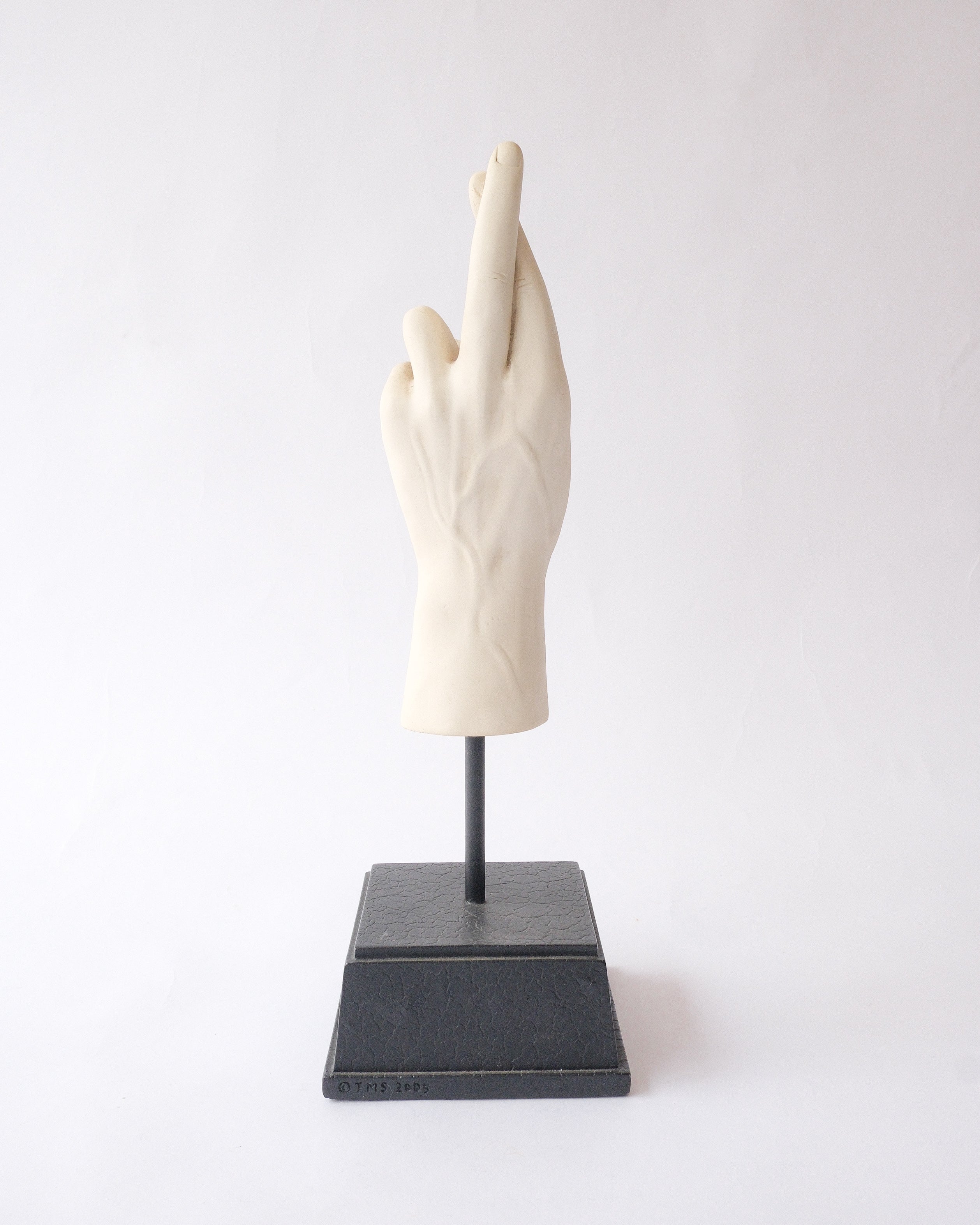 Hand sign plaster sculpture
